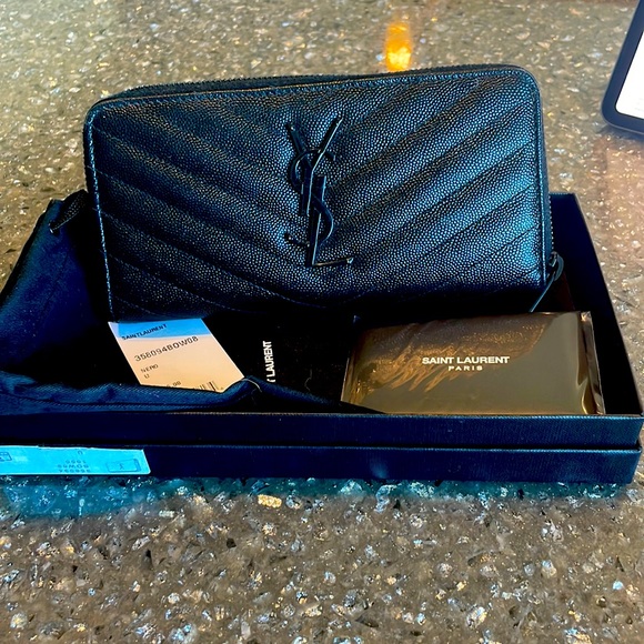 Yves Saint Laurent Handbags - YSL black pebbled leather zip around wallet.